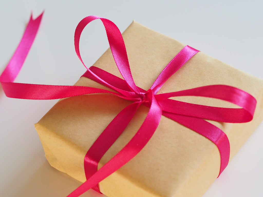 gift wrapped up in pink ribbon