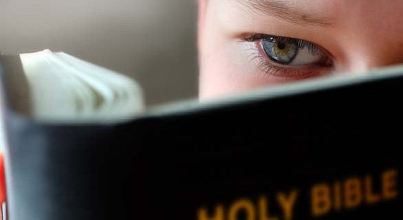 Boy Reading the Bible