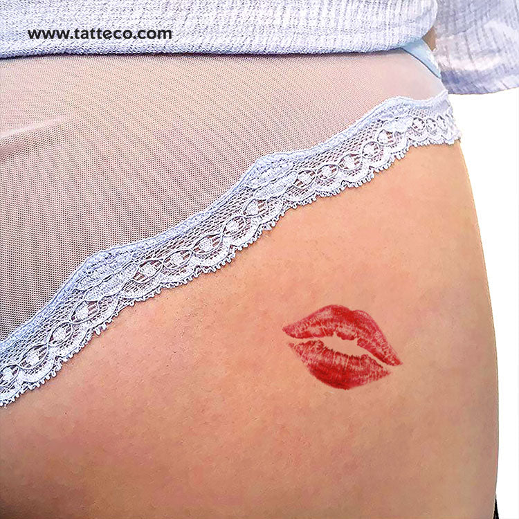 kiss mark tattoo