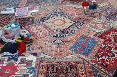 Layering Persian and Oriental Rugs