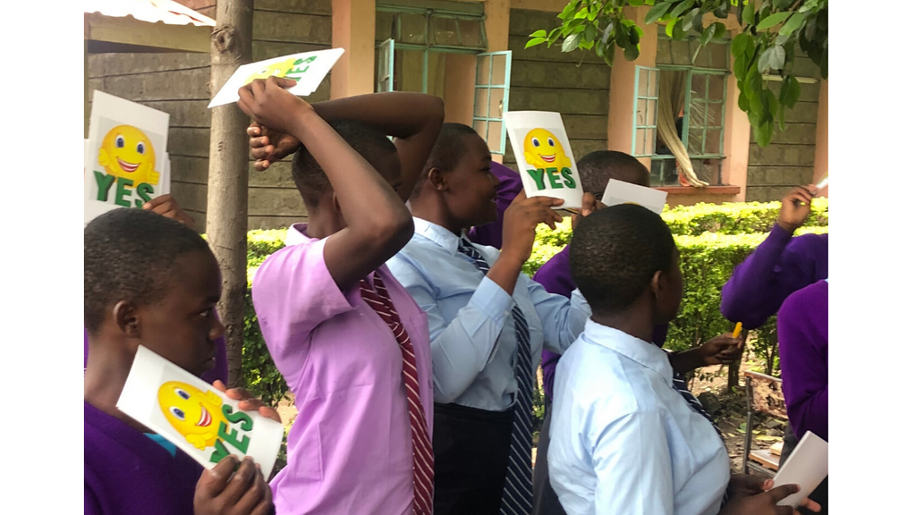 Students at St. Agustine Kandege school (Kisumu, Kenya) at participating in our menstrual health workshop and sharing feedback about their use of the Ruby Cup