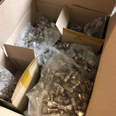 Guitar parts in boxes