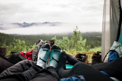 two people sharing space while couples camping