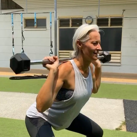 Dani Stevens weighted squats