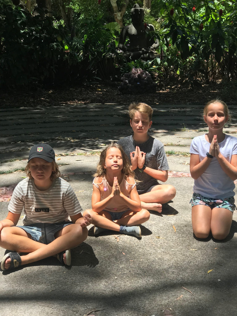 Noah, Oscar, Mietta and Zali Stevens practicing their nasal breathing.