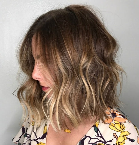 Medium length shag with dimensional blonde balayage