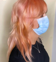 Rose gold apricot coloured hair