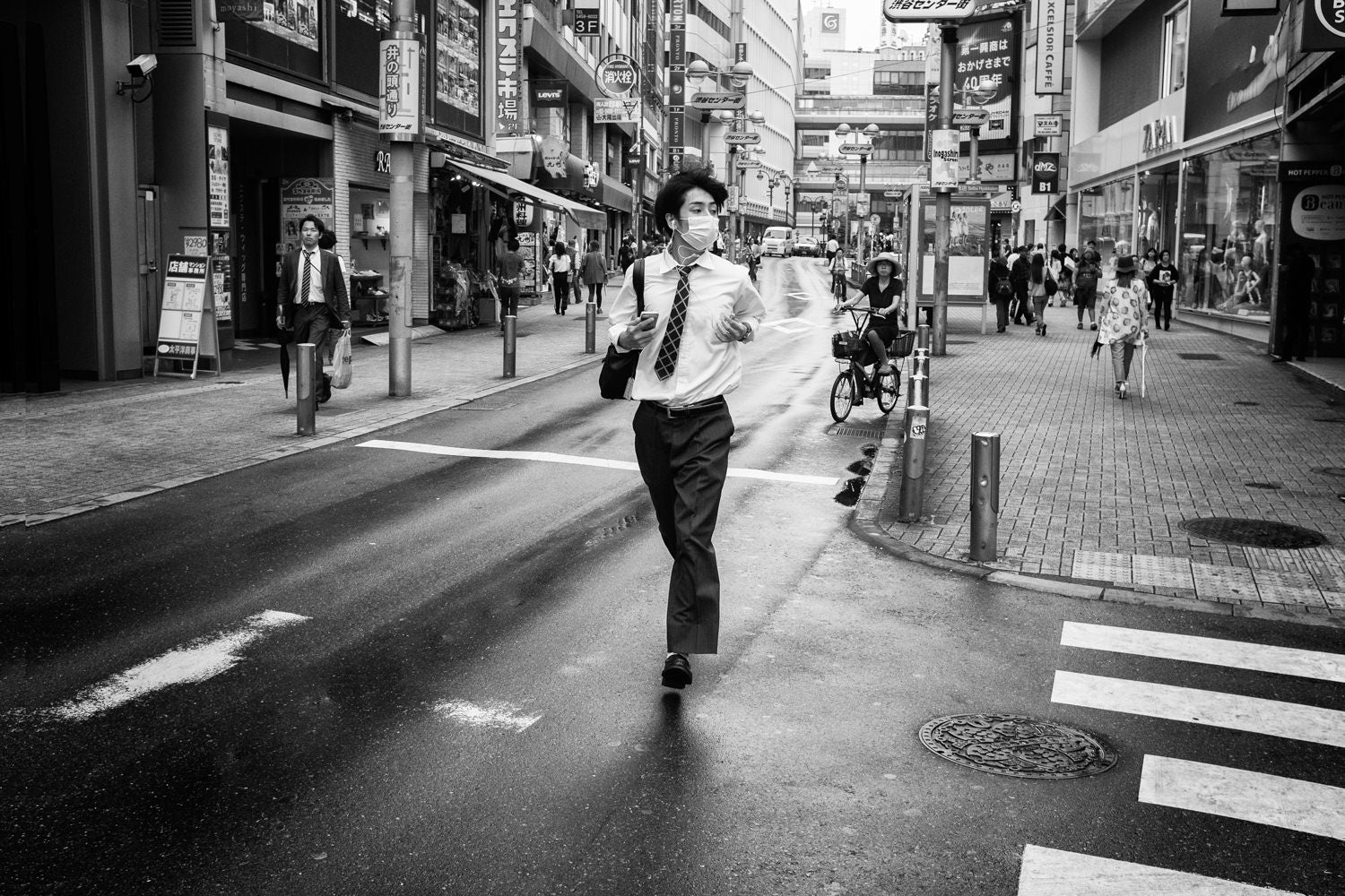 Man In streets of Tokyo Leica MP-10 Sample photo