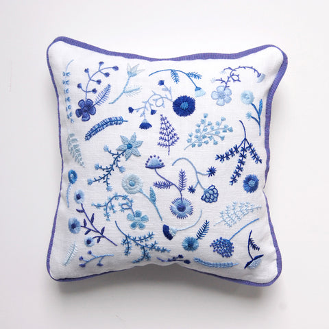 https://www.happycactusdesigns.com/products/hand-embroidered-blue-flowers-pillow