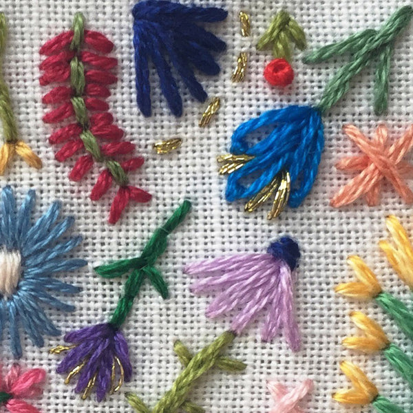Happy Cactus Designs hand embroidered flowers with embroidery floss and gold thread