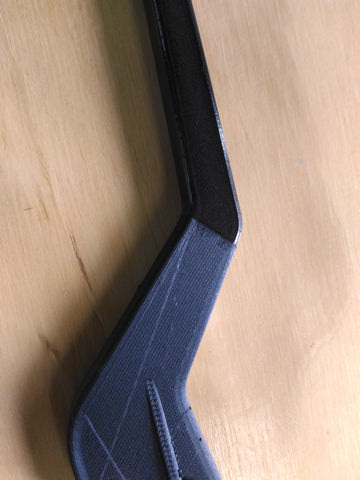 Picture of Carbon fiber 3d printed part covered in XTC 3D epoxy coating at Voxel Factory