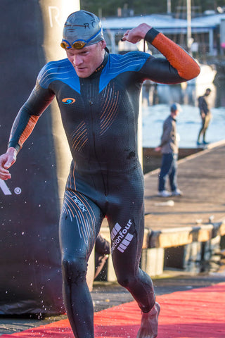eric lagerstrom exits water at ironman 70.3 oceanside