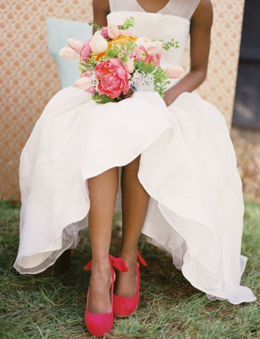 Bride with red shoes for a splash of colour