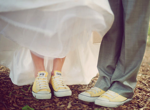 Matching couple with yellow sneakers for wedding