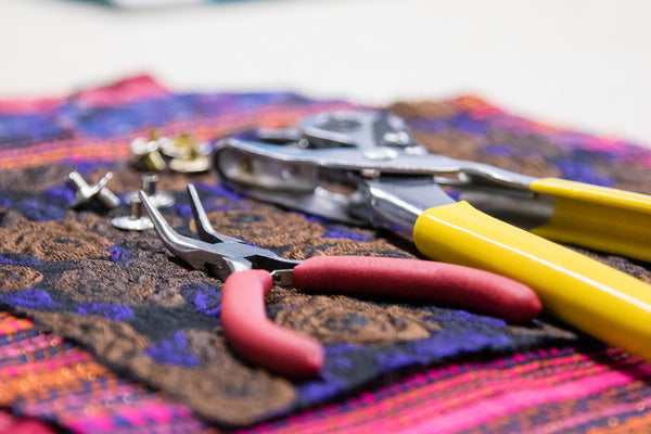 snap setting tools at crystalyn kae's studio in Brooklyn Fashion Design Accelerator