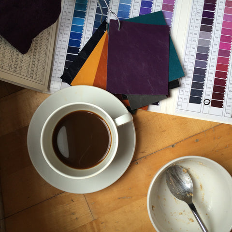 coffee cup and color swatches designer handbag studio