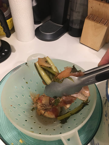 strain the scraps into a colander