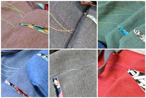 detail of tweed bags with colorful topstitching
