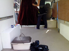 Van with carpet, Folding double bed. Before its packed