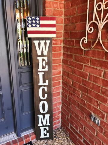 Glory Haus Welcome sign with American flag