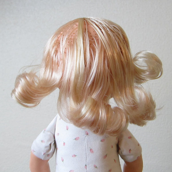 Doll hair after conditioner is rinsed out