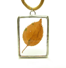 Soldered Glass Pendant Necklace with Yellow Pressed Leaf