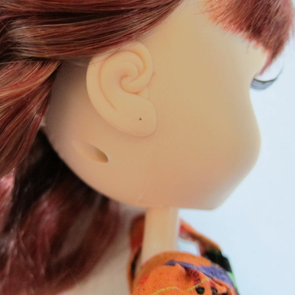 Pullip doll with pencil marked ear hole