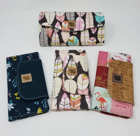 New inventory:  One Necessary Clutch Wallet and three Slimline Wallets
