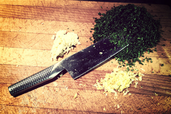 Chopping ingredients for Chimichurri sauce