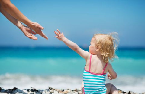 Beach baby checklist, a guide of what to pack for baby and toddlers summer holiday abroad.