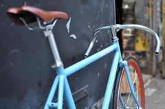 Picture of Regal Bicycles bike the Marquise with a light blue frame and red rims, built for speed