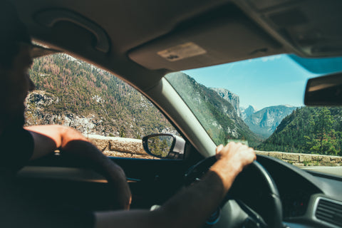 A man driving a car