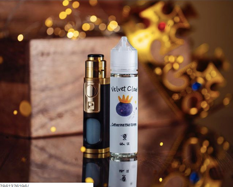 e-cigarette with vape juice sitting on table
