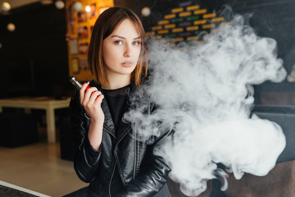 woman vaping in store