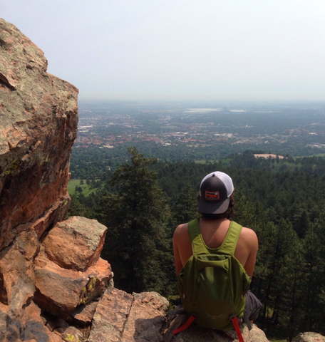 luc ried sitting on a mountain in colorado