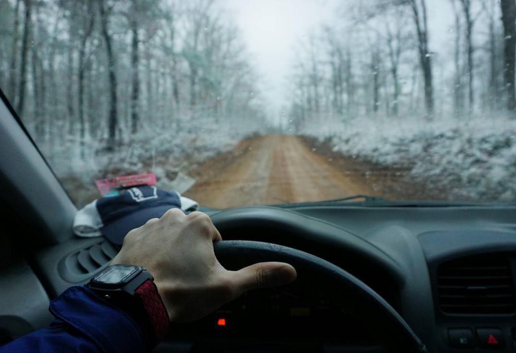 road trip on a dirt road by tristan stalbaum