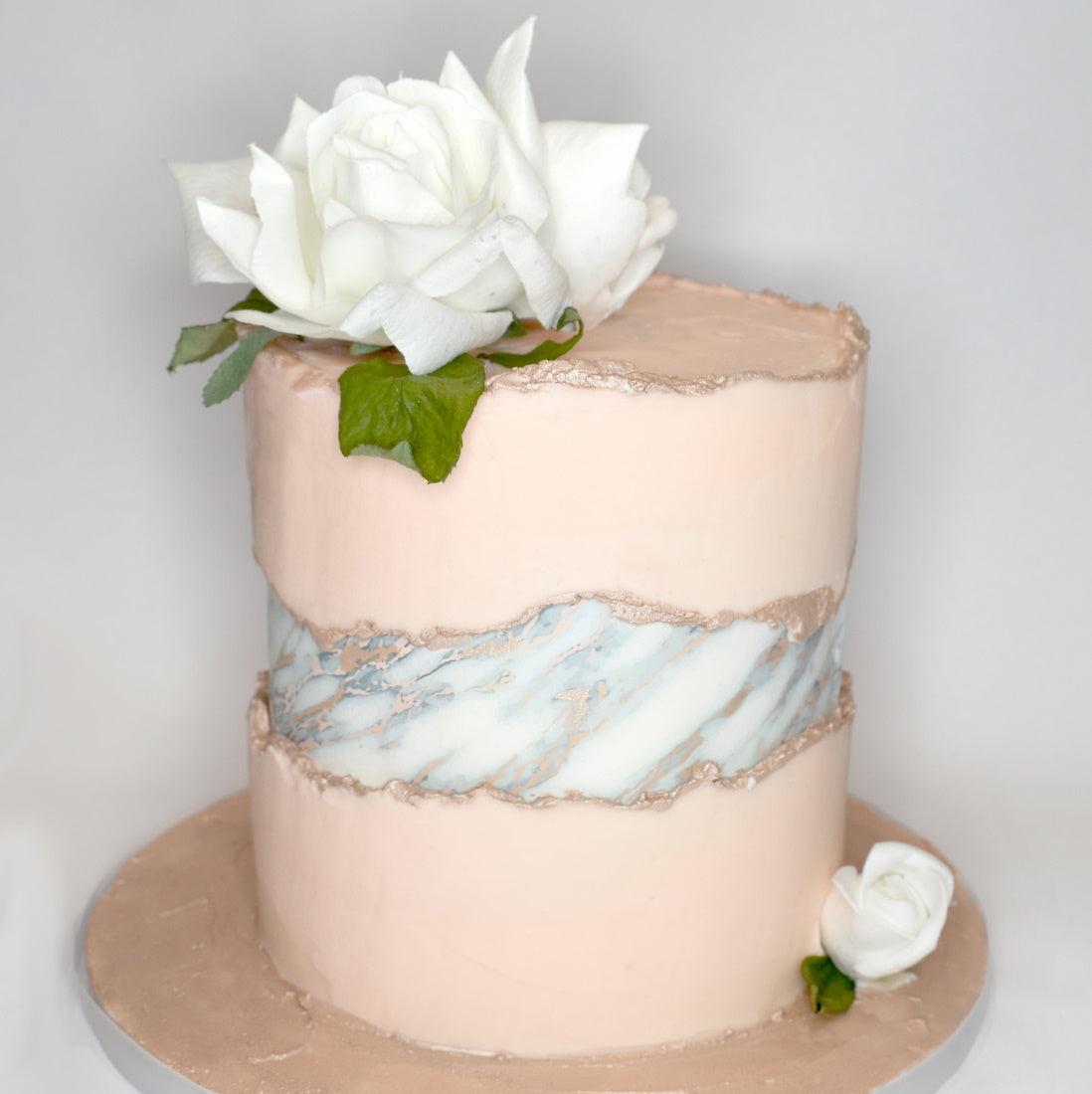 White and Rose Gold Marble cake wrap used for a faultline cake