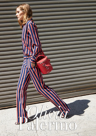 Olivia Palermo Carrying Poppy Red Severine Bucket Bag