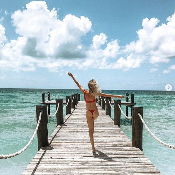 Lauren Bushnell in Bahamas wearing red bikini from Frankies Bikinis