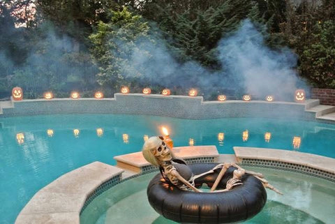Skeleton sitting in pool