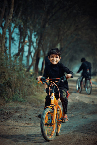 Boy Riding bicycle
