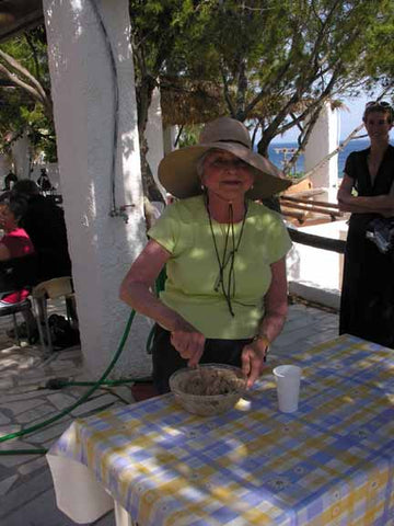 Billie mixes rye flour to seal the still