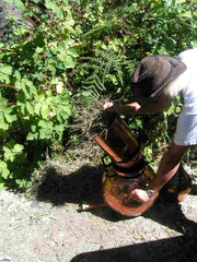 After distillation, the flowers are spent and dumped out of the rotating column. Alembic Head is also emptied