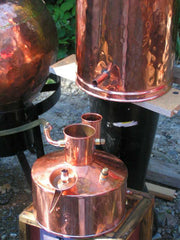 The distillate begins to flow into specially designed Florentine Separator