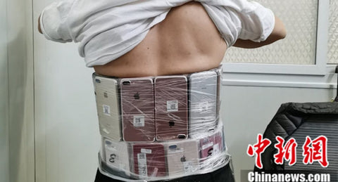 iPhones strapped to body Macau Hong Kong