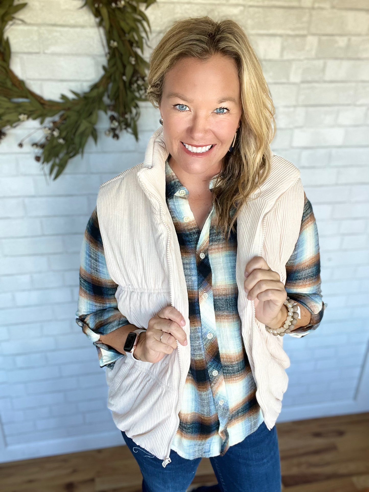 A vest with style and in color choices. Features a zip front in a puffy style; front pockets. Fit is true to size.