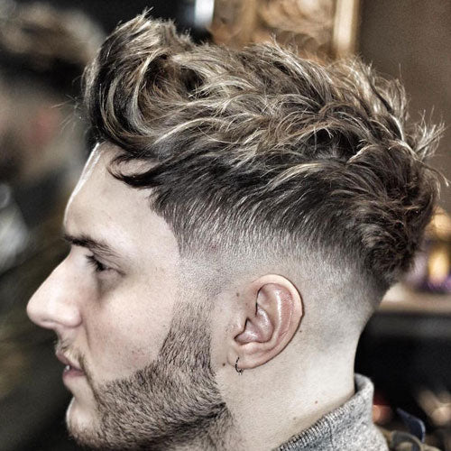 Low Skin Fade with Long Wavy Hair