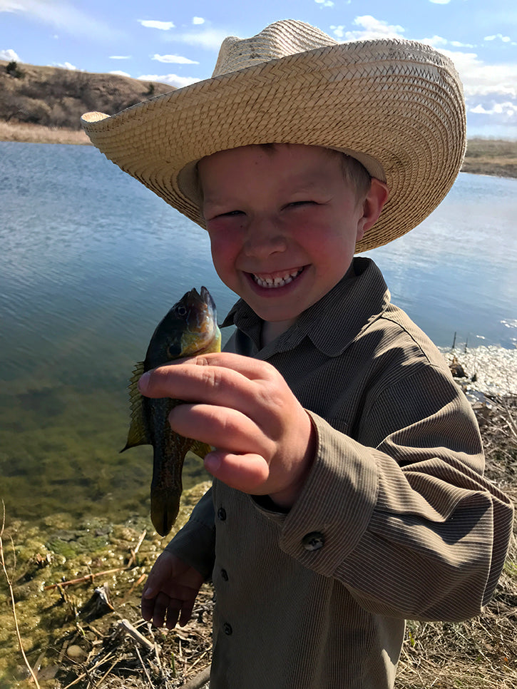 lincoln holding small fish