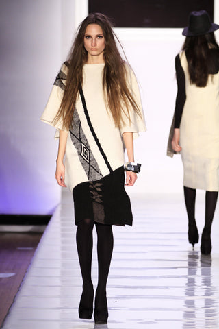 Look 7: Brianna| Diagonal tunic, ivory 100% baby alpaca, hand loomed diamond symbols Skirt, black 100% wool dyed with clay, hand loomed with Anumka symbols