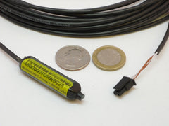 T-Probe with Molex connector next to a quarter and a Euro to show size